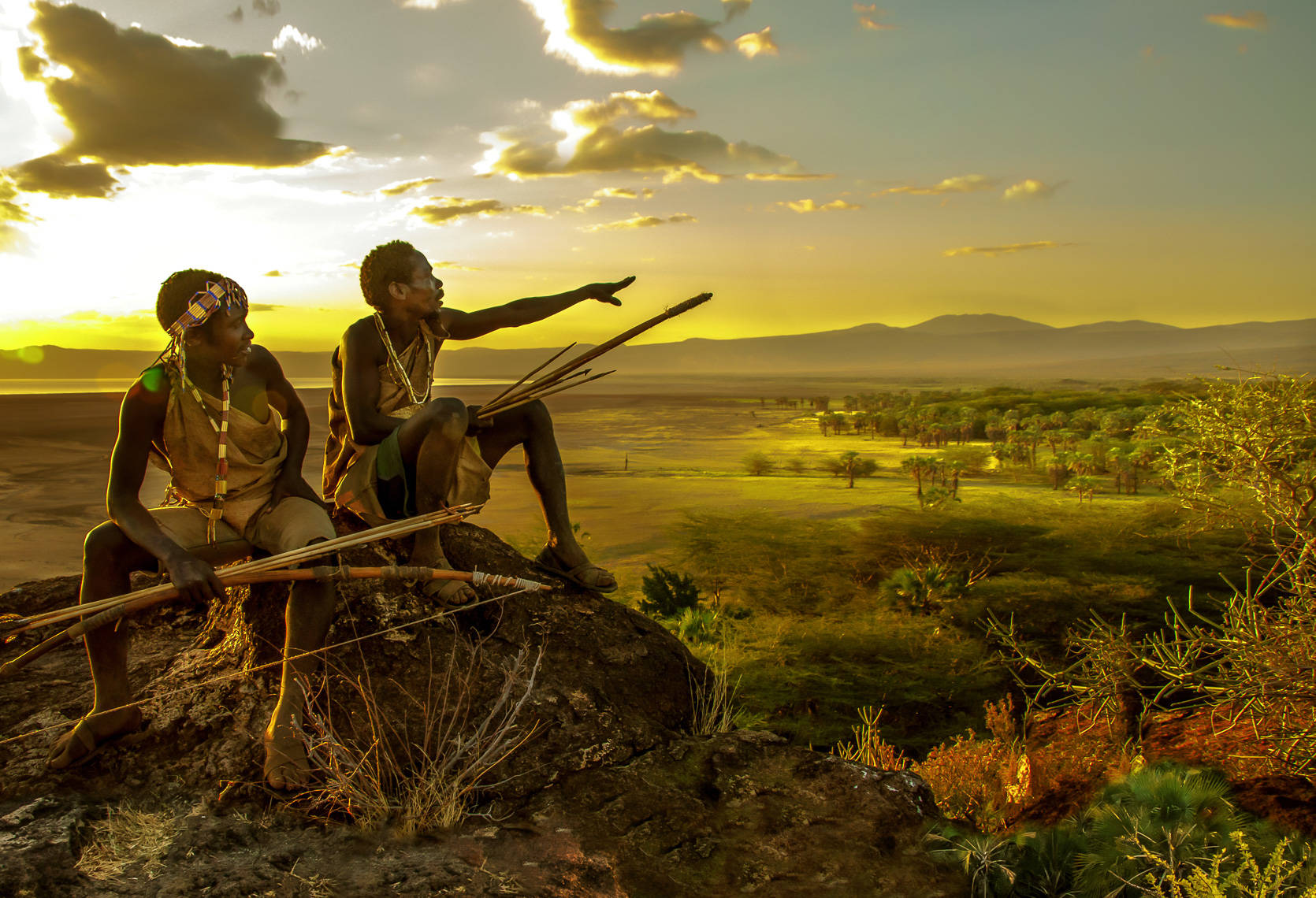 Two Hadza hunters overlook their territory bordering Lake Eyasi, east of the Serengeti Plains, Tanzania. (Carol Beckwith and Angela Fisher photo)