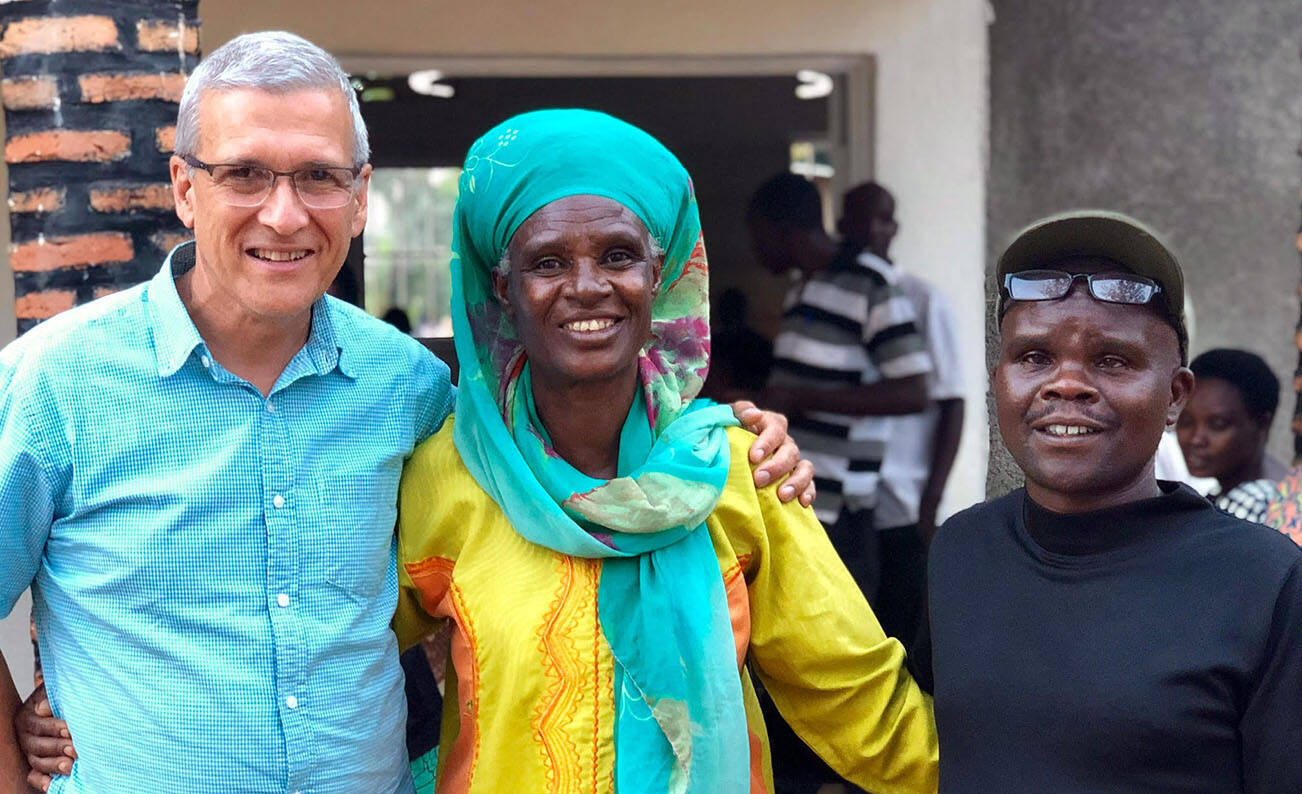 <em>Photo courtesy of Carl Wilkens </em>
Wilkens in Rwanda in 2019 with a survivor who has reconciled with the man who killed her husband and sons