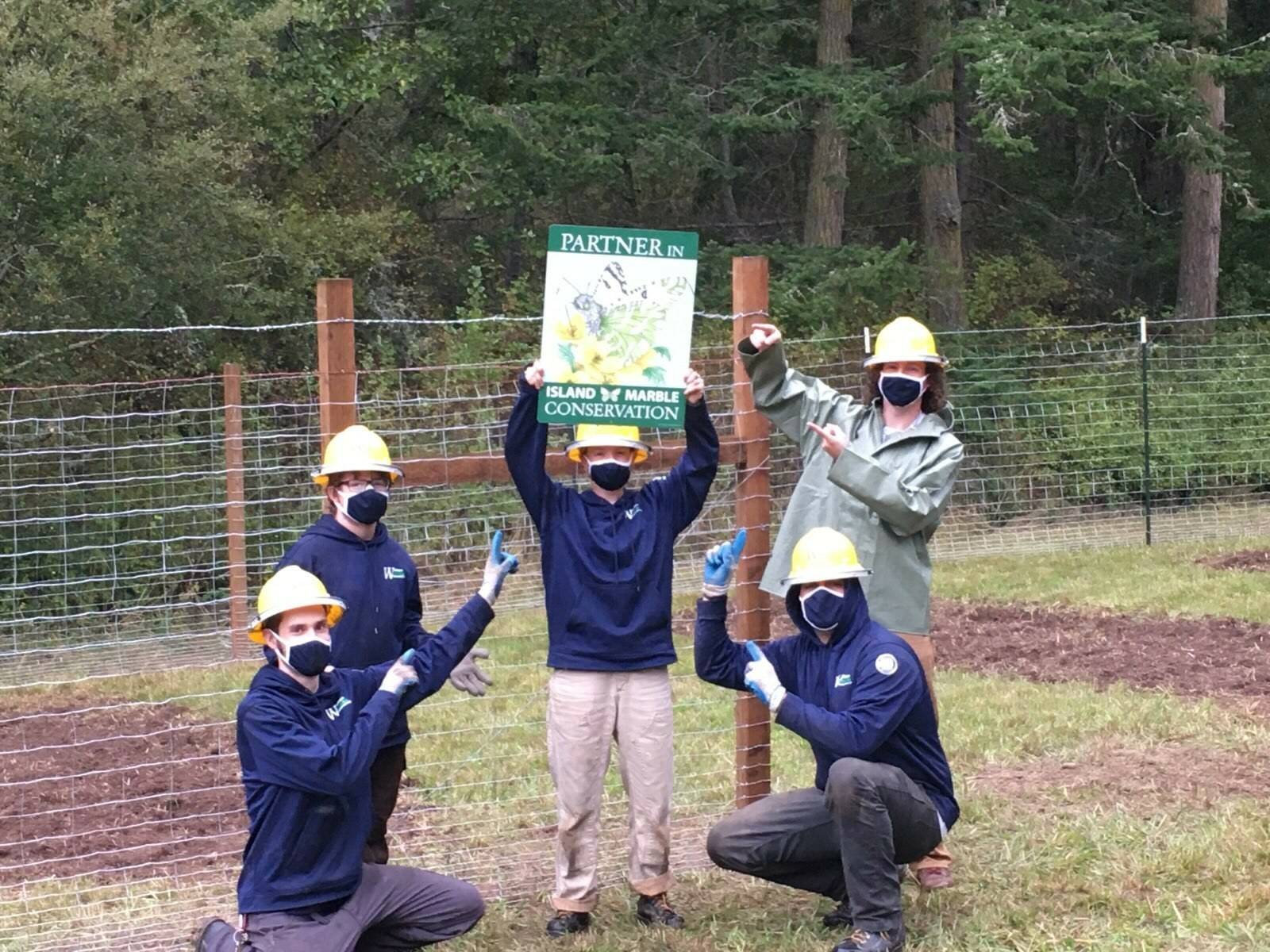 Contributed photo
Washington Conservation Corps crew celebrates the completion of another protected butterfly habitat.