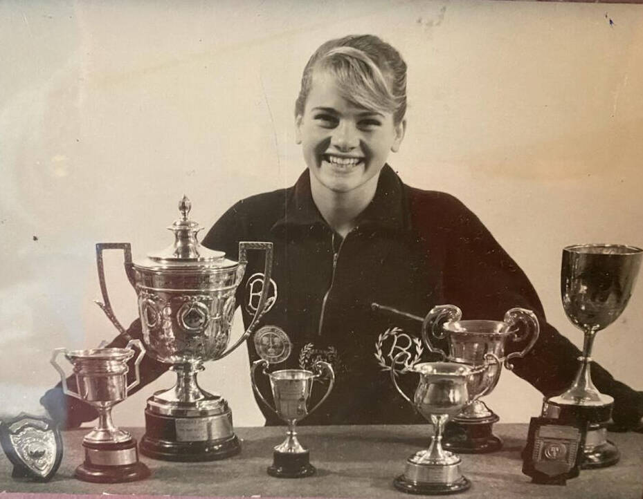 Contributed photo
Rita O’Boyle as a young adult, with her swimming trophies.