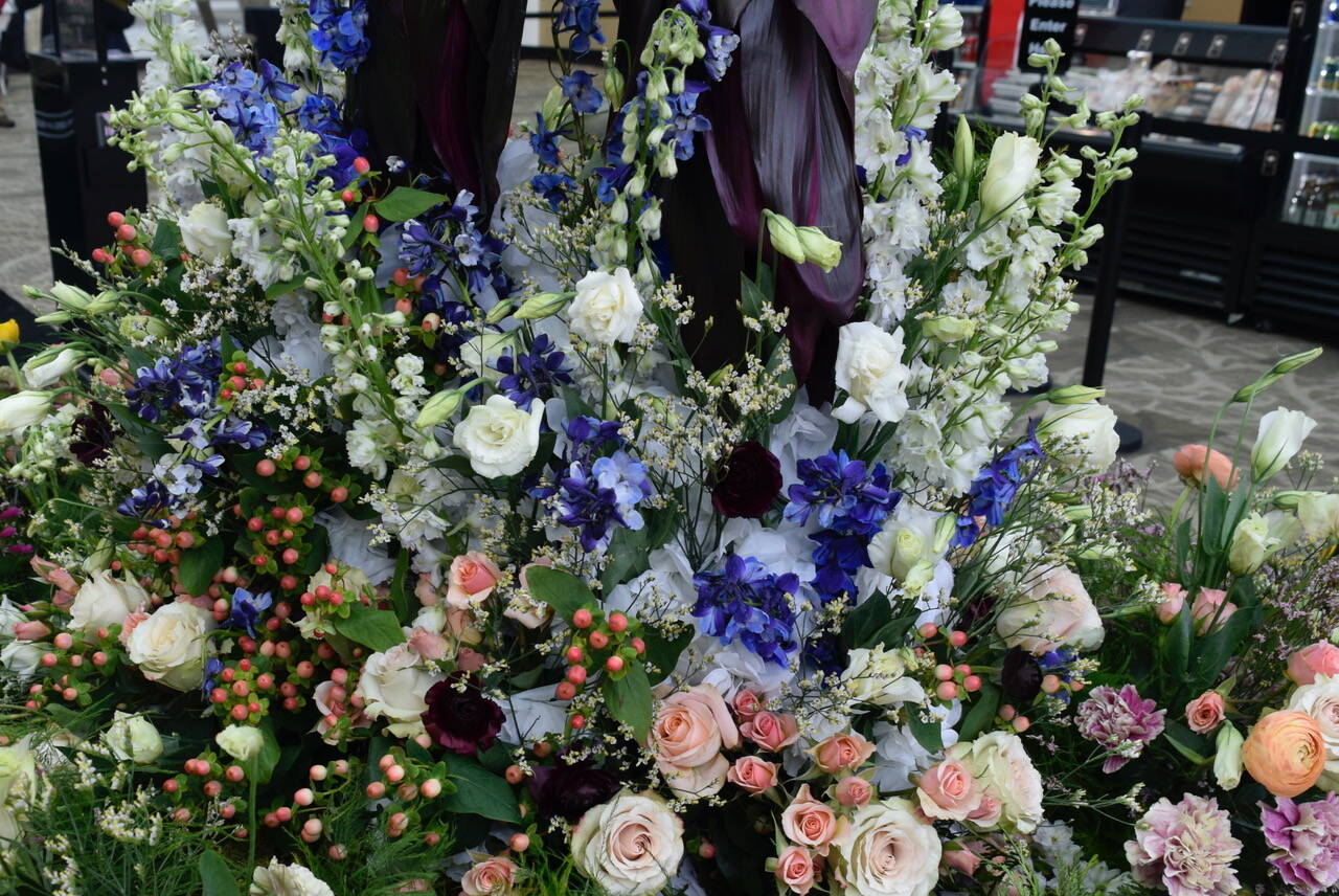 Patricia Guthrie/Contributed photo
St. John’s wort, Larkspur delphinium, roses and Hypericum berry are a few of the flowers used in the design.