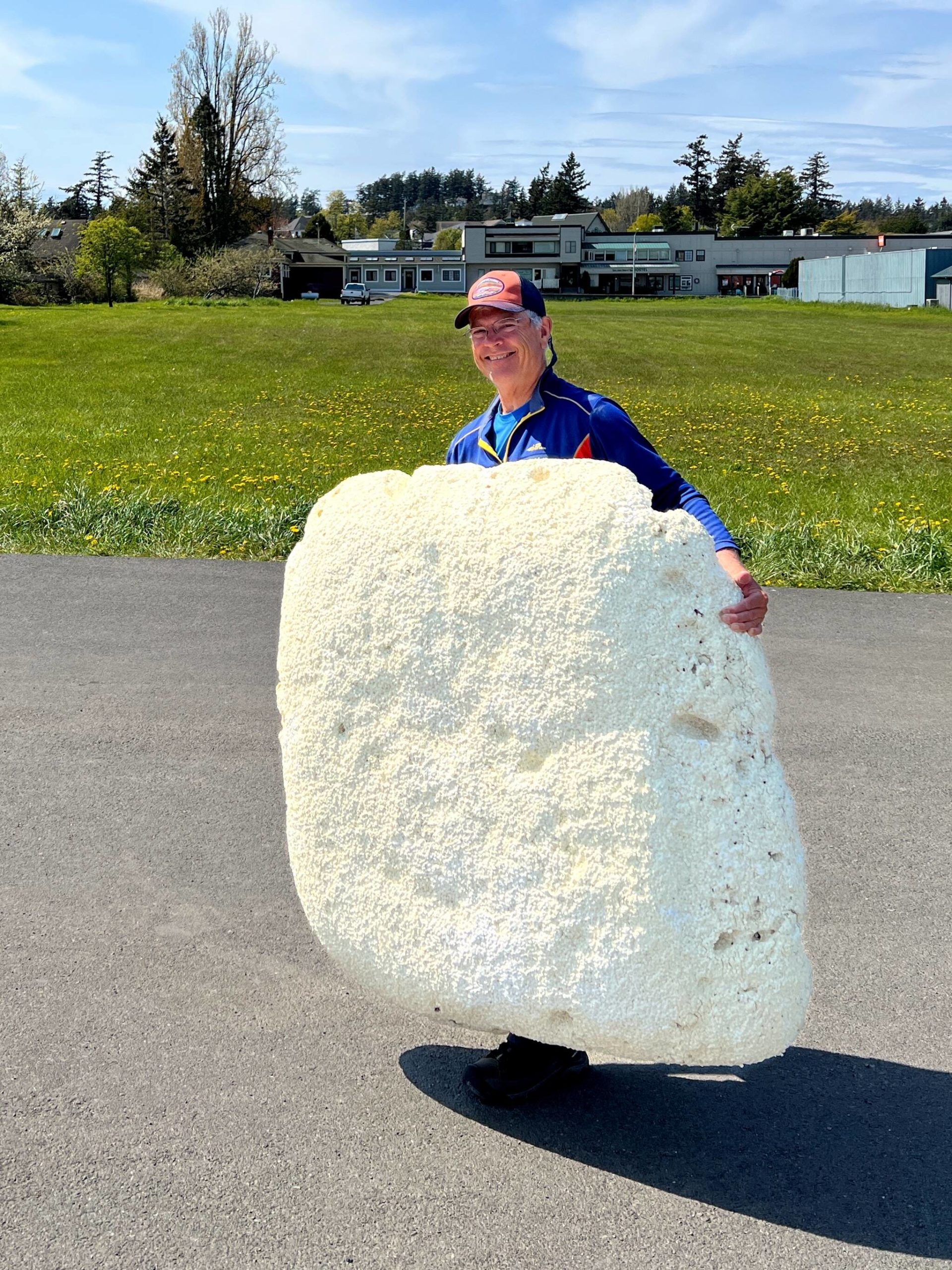 Contributed photo
Jim McNairy from San Juan Island carries a large piece of Styrofoam he collected from Jakles Lagoon.