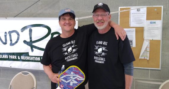 Island Rec/contributed photo
Kurt Larson and Jim Michelson in tournament shirts.