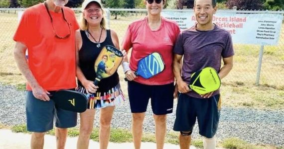 contributed photo by the Orcas Rotary Club 2021 Orcas Island Pickleball Tournament Mixed Doubles champs: Greg Stafford and Jill Bates (gold); Suzanne Olson and Kevin Lee (silver).