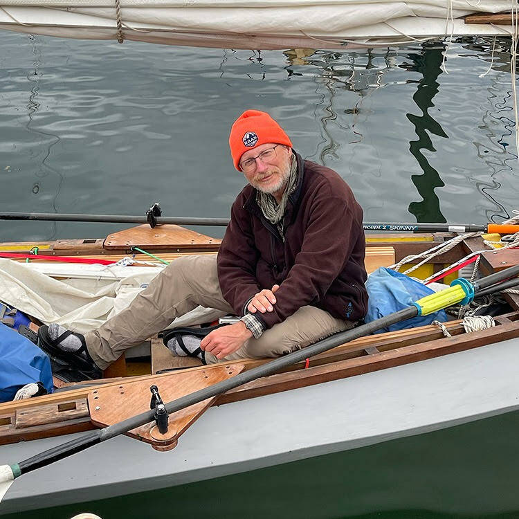 Team Sockeye Voyages captain John Calogero aboard his boat during preparations for departure in the 2022 R2AK Race To Alaska.