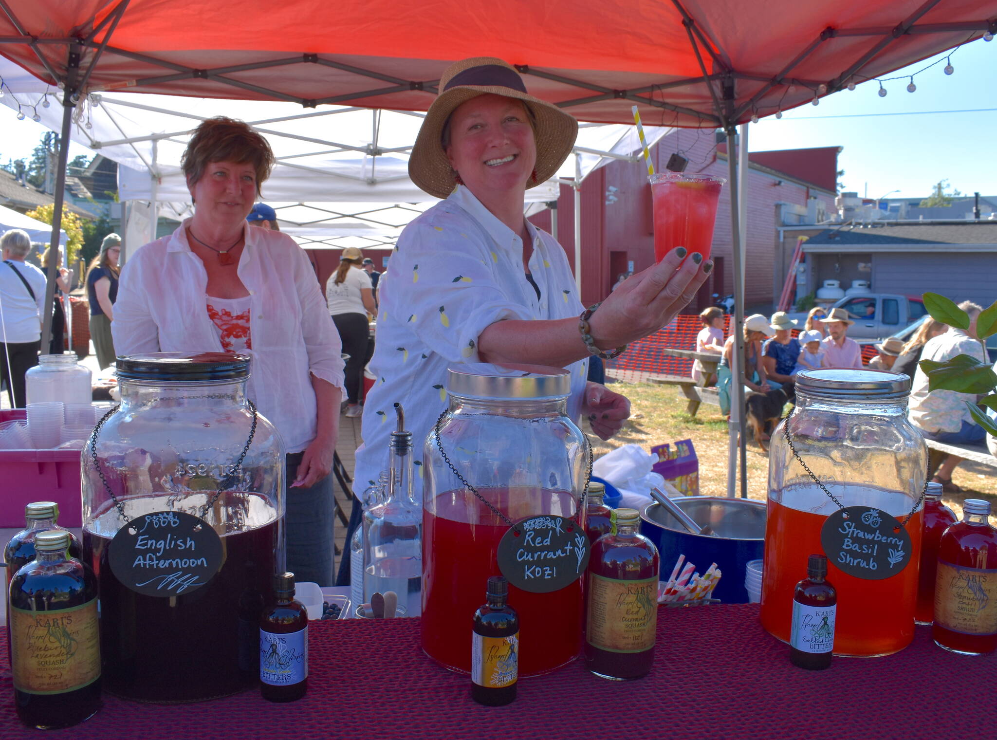 Kari Koski provides a refreshing beverage during the San Juan Summer Arts Festival.