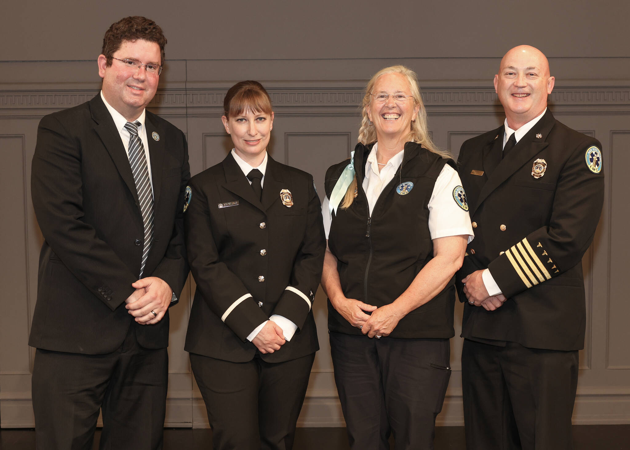 Contributed photo by San Juan County Public Hospital District 1
Left to Right: Nathan Butler, Administrator, Margaret Longley, recent Medic One graduate, Weyshawn Koons, Senior Paramedic and former Training Officer, T. J. Bishop, Assistant Chief of Operations and Training.