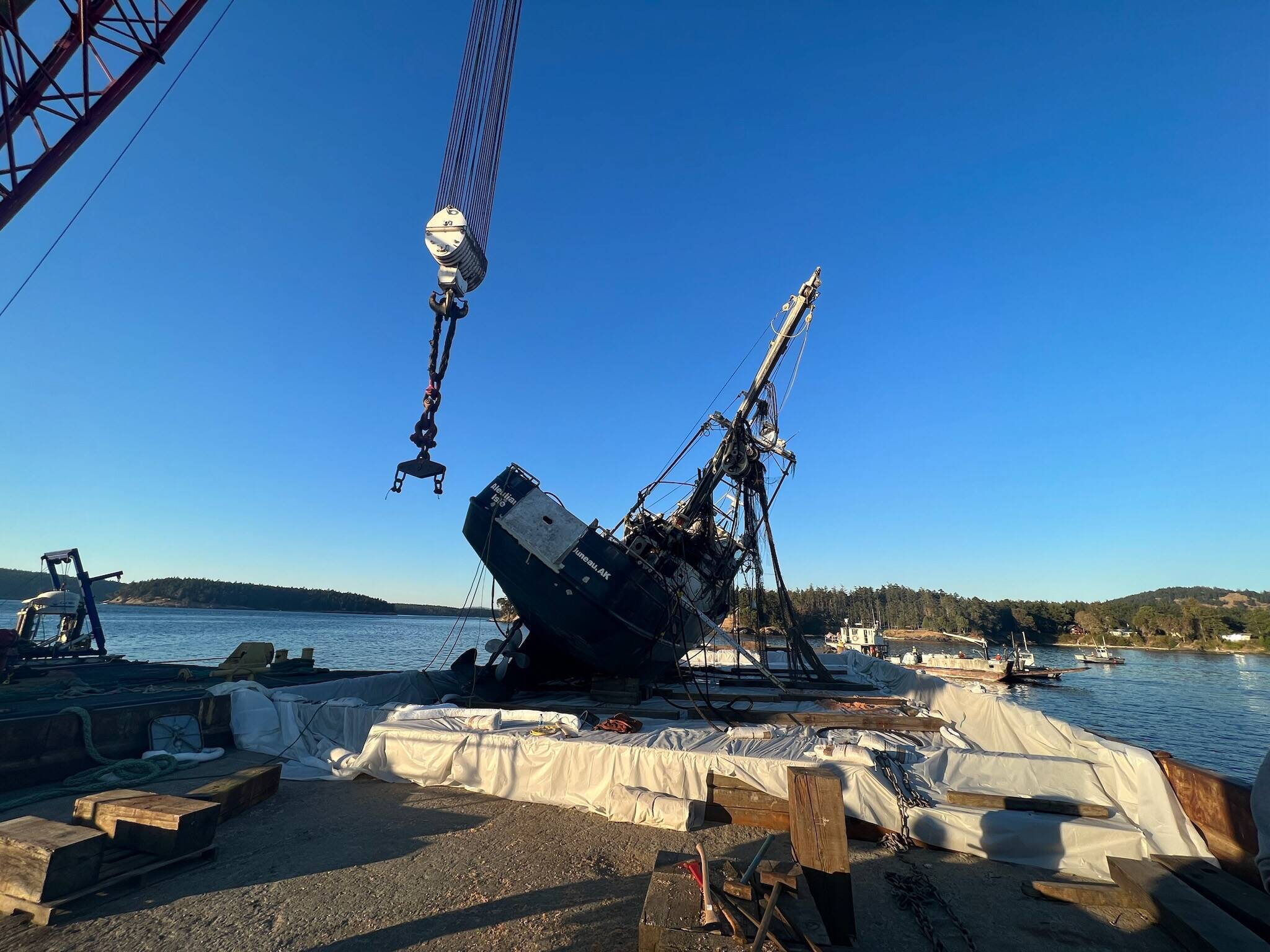 Contributed photo by the Washington Department of Ecology
The Aleutian Isle on a barge after being lifted out of the water Sept. 21.