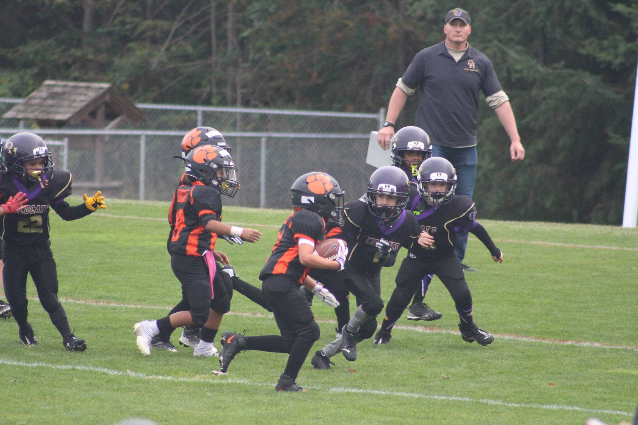 Heather Spaulding \ Staff photo
Pee Wees run to make a touchdown.