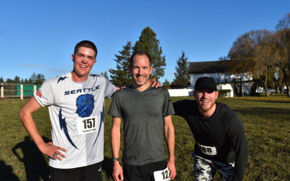 Kelley Balcomb-Bartok / Staff photo.
Top finishers of the 2022 Turkey Trot. From left: Third Place finisher, Friday Harbor Resident and FHHS Class of 2017 Alumni Joe Stewart; First Place Finisher, Dietrich Wieland from Portland; and Second Place Finisher Jack Verzuh of Seattle.