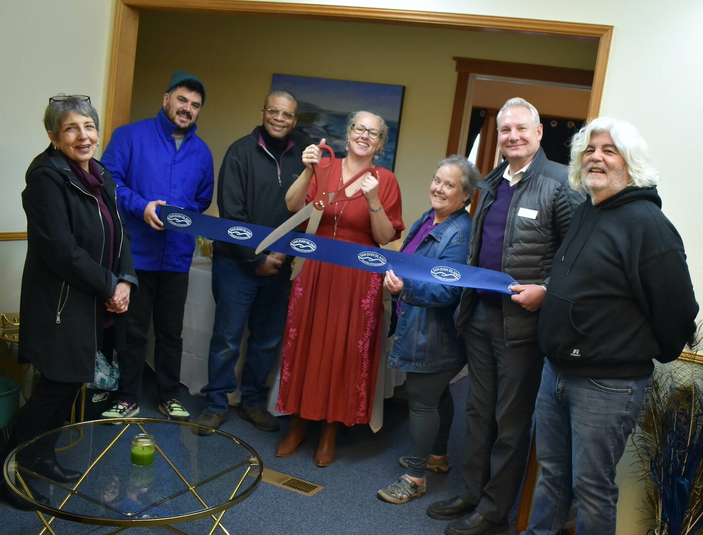 Kelley Balcomb-Bartok / Staff photo
Helen Halverson, owner of LightWorks Studios (holding scissors) is joined by (l-r) San Juan Island Chamber of Commerce Executive Director Becky Day, Roberto Moya, Friday Harbor Mayor Ray Jackson, Kris Brown, Scott Sluis, and Carl Bruno at a ribbon cutting event February 6 celebrating the opening of LightWorks Studios.