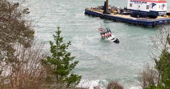 Contributed photo
A 45’ tug boat carrying approximately 400 gallons of diesel fuel partially sank off the Lopez ferry terminal Wednesday morning.