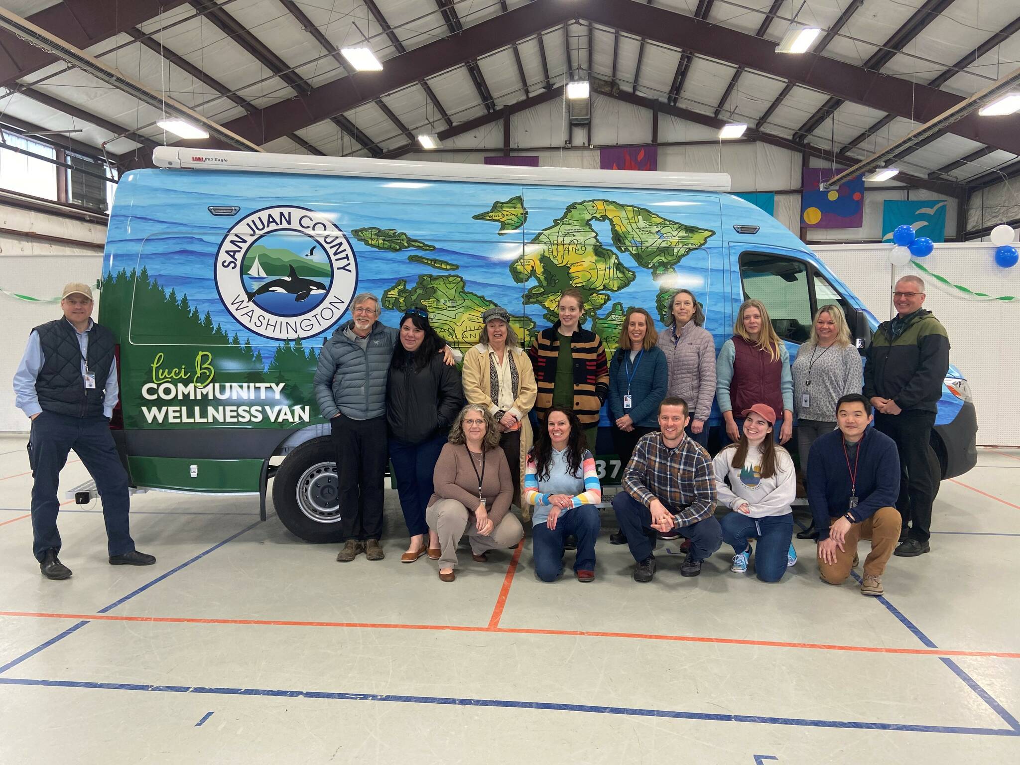 Contributed photo
San Juan County Health and Community Services staff pose with the County's new Community Wellness Van "Lucy B." Staff include (l-r): Back: Kyle Dodd, Dr. Frank James, Stephane Stookey, Lori LeCount, Jessica Nye, Kristen Rezabek, Melinda Hallen, Zoe Froyland, Jessica Moseley, and Mark Tompkins. Front: Emily Mason, Nicole Givan, Ethan Schmidt, Melody Smith, and Kirk Sato.