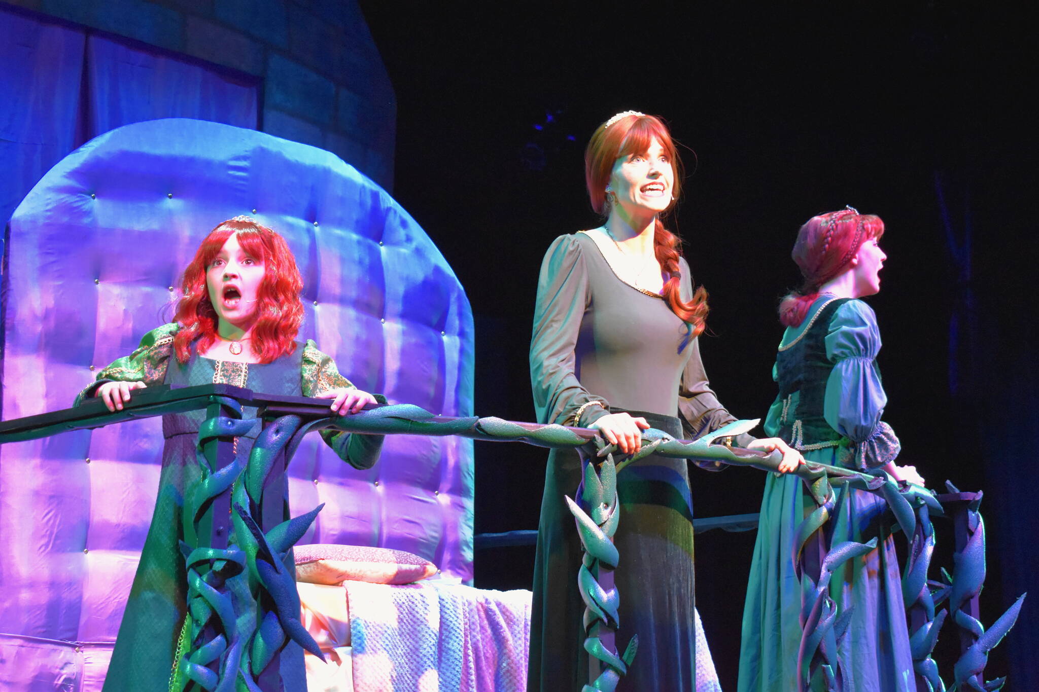 Kelley Balcomb-Bartok / Staff photo
From left, Madeline Rose, Erin Wygant, and Shelby Mullen represent the three stages of fairytale Princess Fiona's life, as they collectively pine to be freed from the castle they've been imprisoned for years.