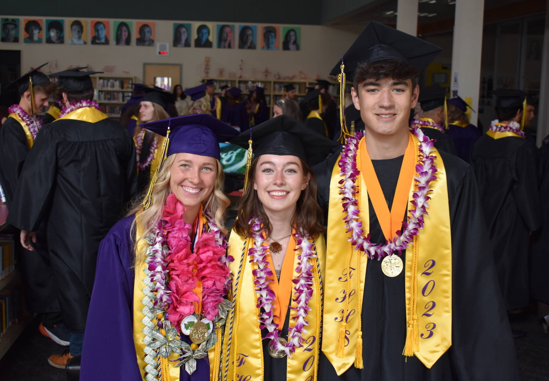 Kelley Balcomb-Bartok / staff photo
Co-Valedictorians Ariana Tucker-Bell, Islay Ross, and Zachary Place pose among their fellow seniors moments before graduation ceremonies are to commence.