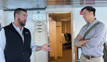 Contributed photo
Rep. Alex Ramel talks to captain Jef Reeves during a tour of the Samish ferry boat.