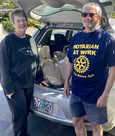 Contributed photo
Lori Stoke and Chris Haynes with food for 36 Weekends