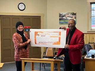 Contributed photo
Food Bank Director Rachelle Radonski, left, and Mayor Ray Jackson, right