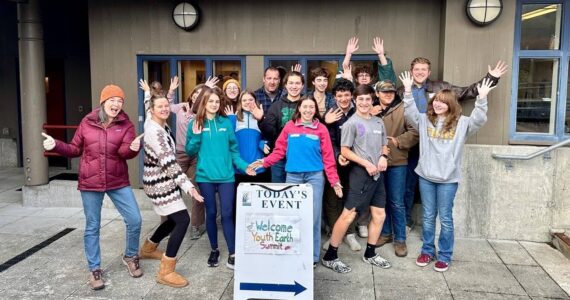 Contributed photo 
Katie, Jess and Mr. Garson, along with 13 enthusiastic Friday Harbor High School students at the Youth Earth Summit.