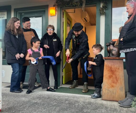 <p>Contributed photo</p>
                                <p>Nate Fihn cuts the ribbon held by his two childen. Chamber Director Becki Day, President Roberto Moya and board member Deborah Hoskins cheer them on. </p>