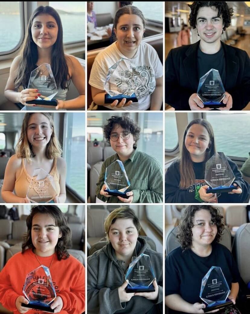 The nine students who attended the state thespian conference pose with the trophy they received for the group’s “Lightening Thief” performance.
Submitted photo