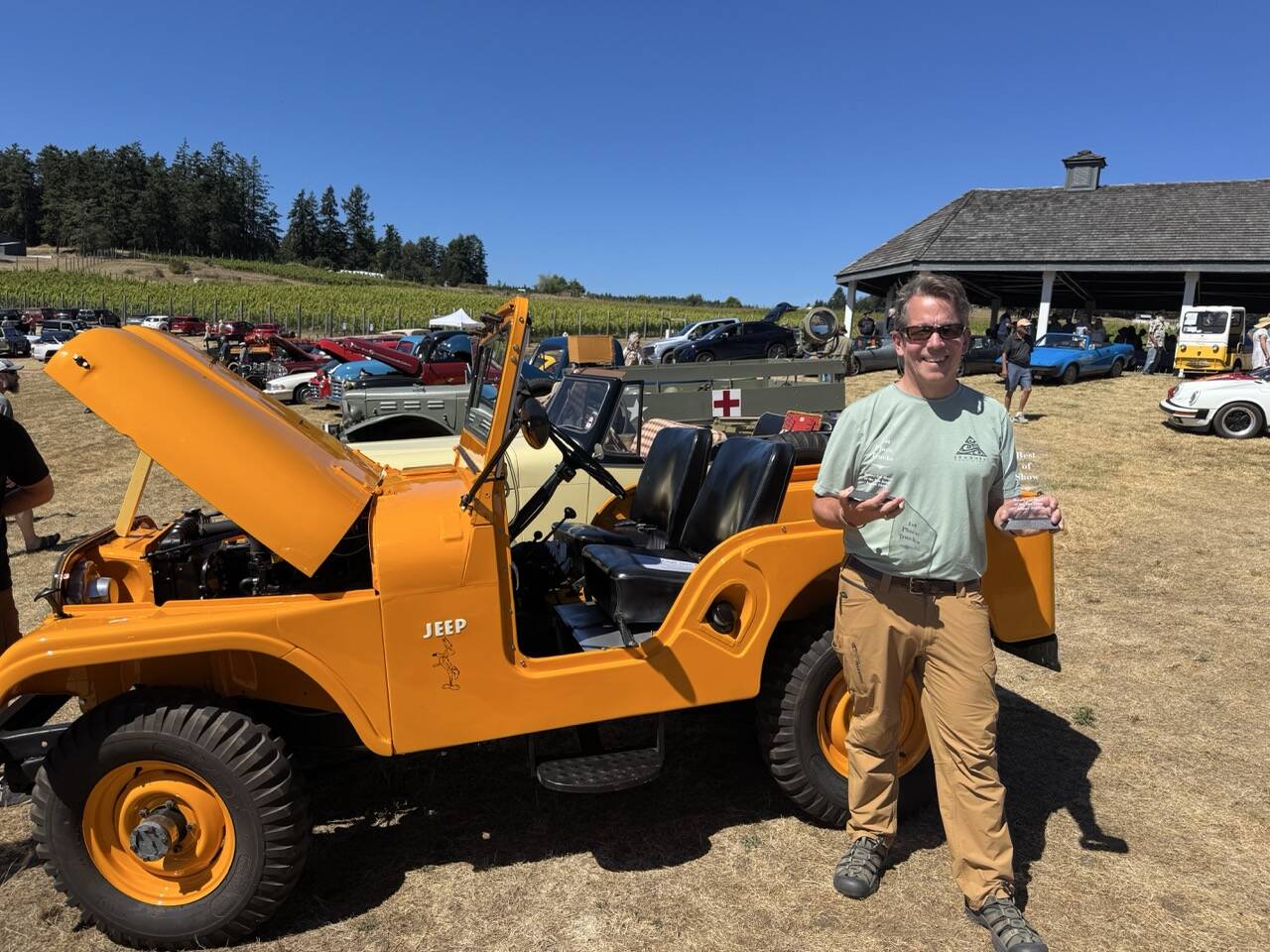 Contributed photo by Adam Eltinge
Dr. John Moalli in front of his 1956 Jeep Willy that won Best of Show in the 2025 Rotary Car Show.