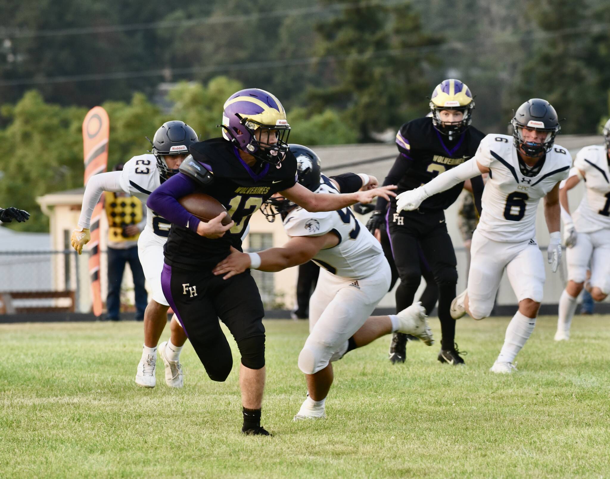 Contributed photo by John Stimpson
Friday Harbor Running Back #13 Duncan Bogart looking for more open field.