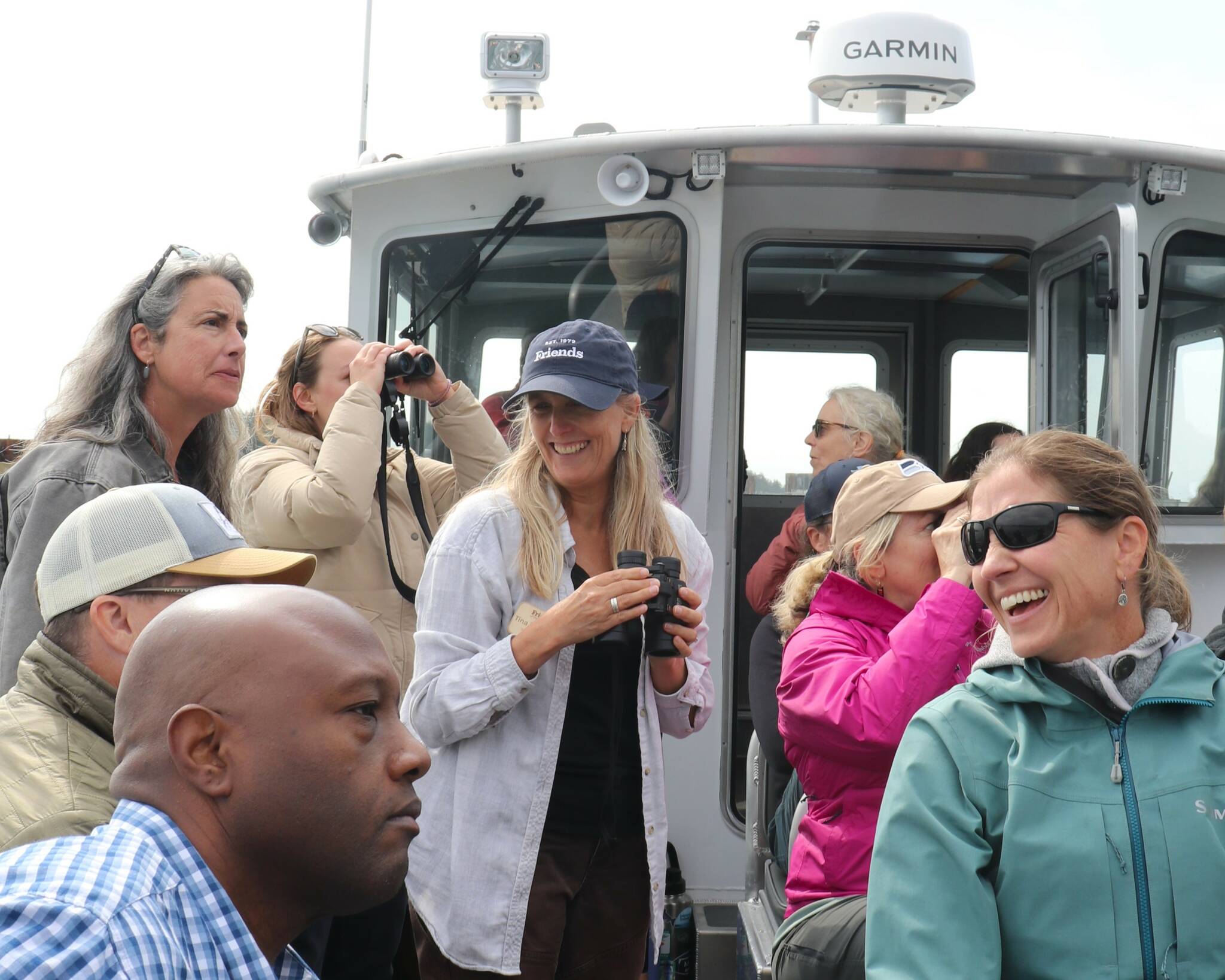 Contributed photo.
Tina Whitman, Friends of the San Juans’ senior science director (center), with local leaders and guests during the shoreline restoration boat tour, discussing strategies to protect and restore nearshore habitats.