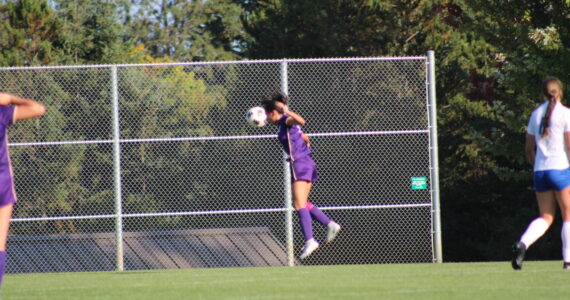 Heather Spaulding / Staff photo
Wolverines take control of the ball with a head shot.