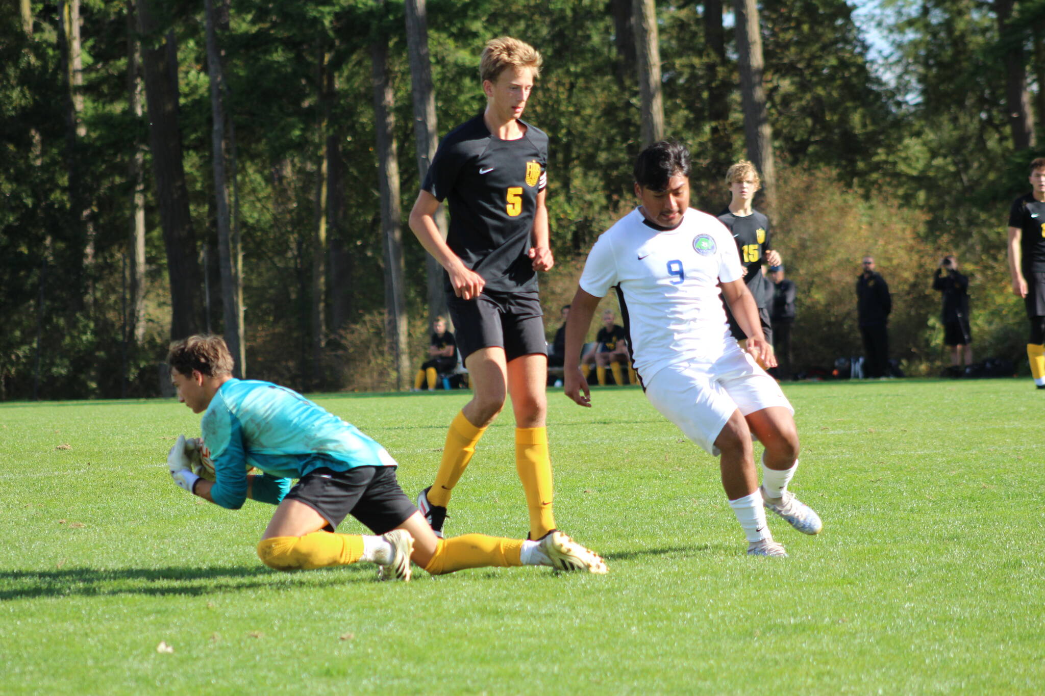 Wolverines goalie protects the ball during the Oct. 2 game at Linde Fields.