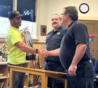 Contributed photo.
Town Streets and Parks Supervisor Justin Nibler, Fire District 3 Battalion Chief Mike Hartzell, and Fire District 3 Chief Noel Monin at the Oct. 2 Town Council meeting.