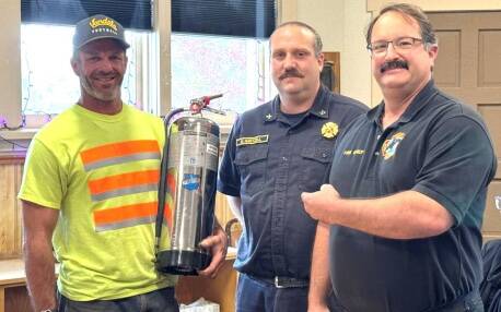 Contributed photo.
Town Streets and Parks Supervisor Justin Nibler, Fire District 3 Battalion Chief Mike Hartzell, and Fire District 3 Chief Noel Monin at the Oct. 2 Town Council meeting.