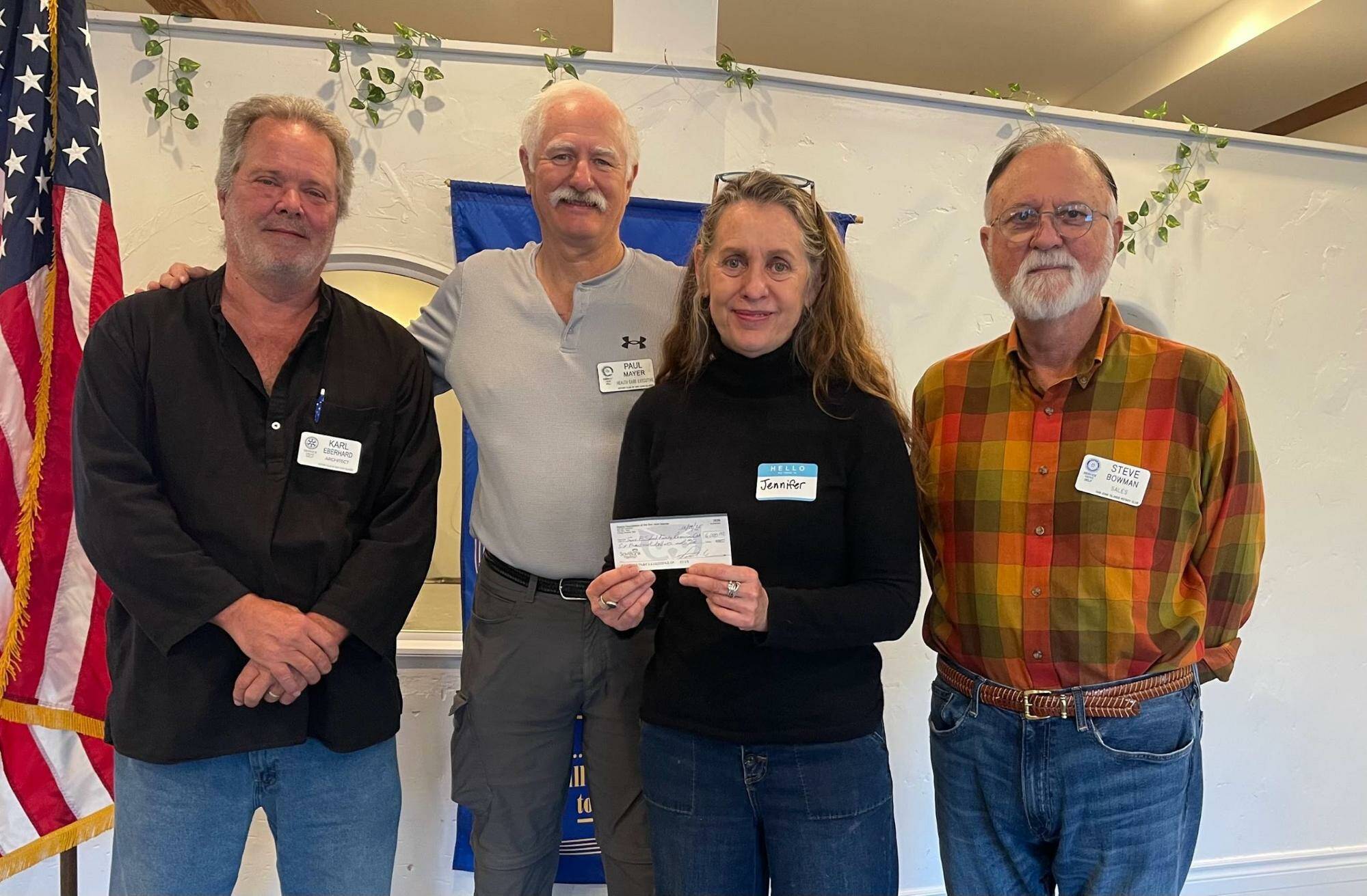 Contributed photo.
L-r: Rotarians Karl Eberhart, Paul Mayer and Steve Bowman present a check to Jennifer Armstrong, executive director of the Joyce L. Sobel Family Resource Center. Armstrongs presentation to the club on Oct. 29 explained the many programs currently offered by the center in support of our community.