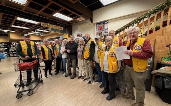 Contributed photo. 
Lions with Verne Howard, owner of Valmark, and Conrad and Margaret Berthold.