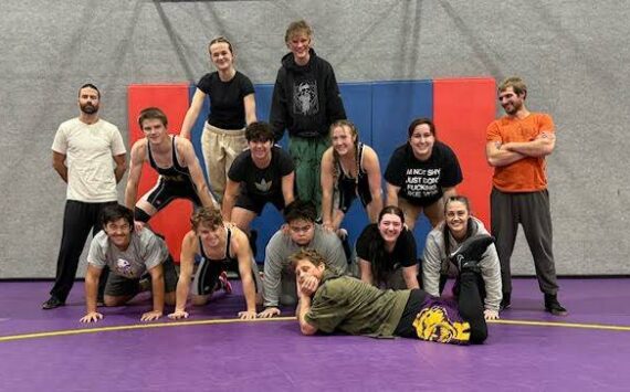 Heather Spaulding/staff photo.
Wolverines wrestling team.
From left to right, top row: Coach Shane Bison, Millie Nibler, Chelsea Pittman and coach Michael Davis
Second row: Grayson Mathews, Clara Borner, Liz Hough and Vannessa Chambers
Front row: Henry Pope, Ash Hamlin, Boaz Moses, Isabelle Dirksema and coach Sabrina Bremer with head coach Tad Bremer in front.