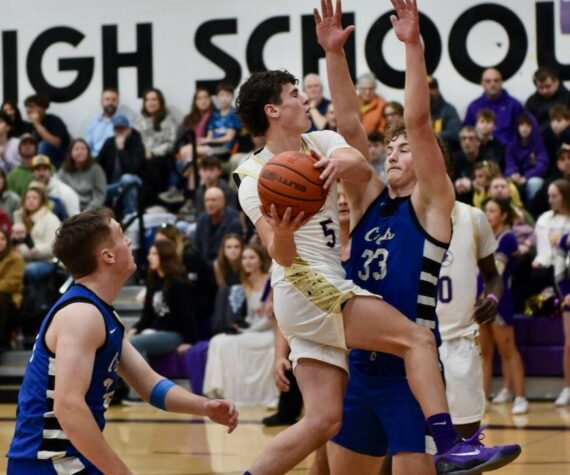 <p>Contributed photo by John Stimpson</p>
                                <p>Channing Klein, #5, sails up to the basket.</p>