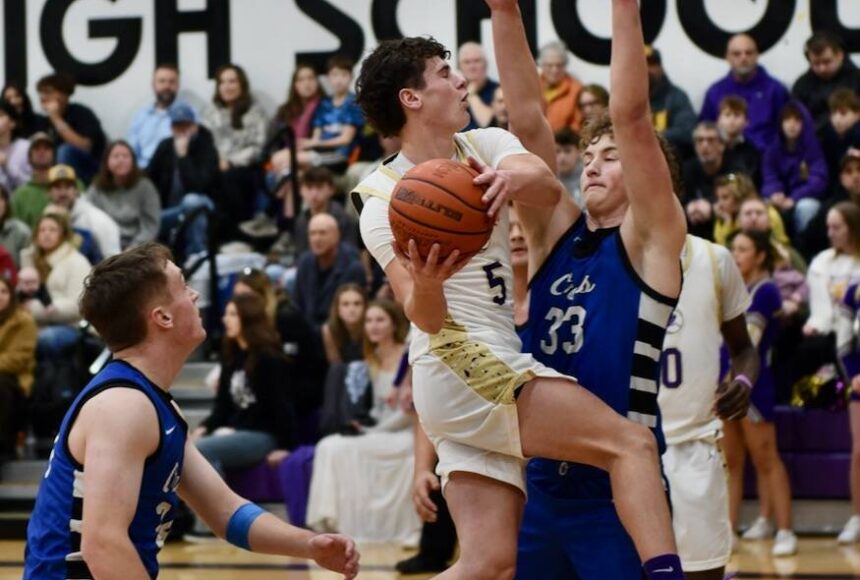 <p>Contributed photo by John Stimpson</p>
                                <p>Channing Klein, #5, sails up to the basket.</p>