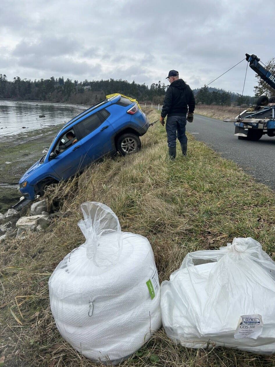 Contributed photo.
Jan. 7, 2025: Most of IOSAs responses involve boats, but thats not always the case. A report of a car in False Bay on San Juan brought Deputy Director Rick Winings out with absorbents and other gear, ready to deal with a car-sized spill. Fortunately, no spill occurred, and the sheriff towed the car away without incident.
