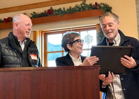 <p>Heather Spaulding/staff photo.</p>
                                <p>At left: Steve Buck and Becky Day present Brent Snow with the Sam Buck Community Service Award.</p>