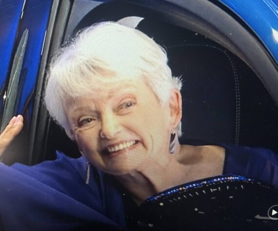 <p>Above: Friday Harbor resident Mary Ellen Judge in her new car on Wheel of Fortune.</p>