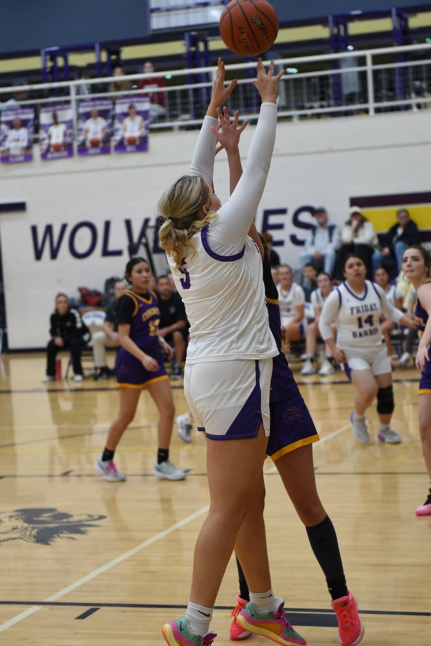Contributed photo by John Stimpson
Lola Clark, #5, launches a two-point shot.