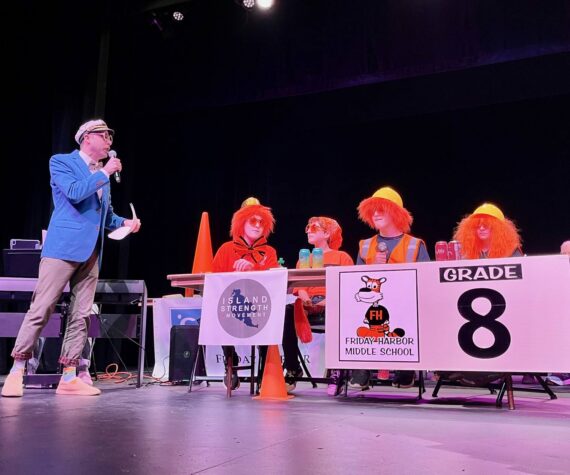 <p>Contributed photo</p>
                                <p>Mason Turnage MCs as 8th graders get ready to tackle tough questions at 2025&rsquo;s Knowledge Bowl.</p>