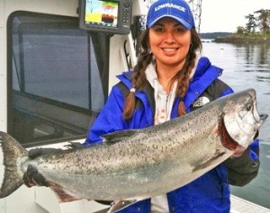 San Juan Island's Carol Holman displays a 'keeper' caught during the 2014 Frank Wilson Fishing Derby