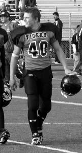 Nate Steenkolk ... injured his neck as he caught a C.J. Woods pass for a touchdown