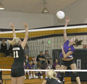 Friday Harbor’s Kayla Short smacks a winner over Katie Wasel of Meridian