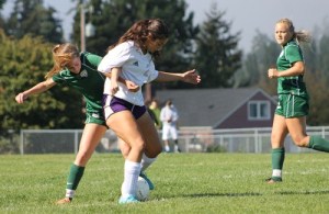 Kaitlyn Domenech advances the ball against Bear Creek