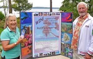 Pirrette Rouse shows the single raffle ticket that she purchased to win nine days and eight nights in a two-bedroom condominium on the Kona side of Hawaii.