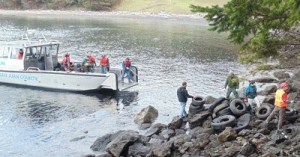 With a boat on scene to haul the debris