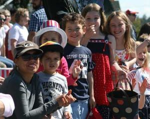 Floats and candy await for young spectators lining the streets of Friday Harbor for the annual 4th of July parade.