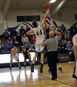 Senior Kyle Jangard battles for the ball during the first round of the State tournament. The boys beat Ocasta and will move on the elite 8 tournament in Spokane.